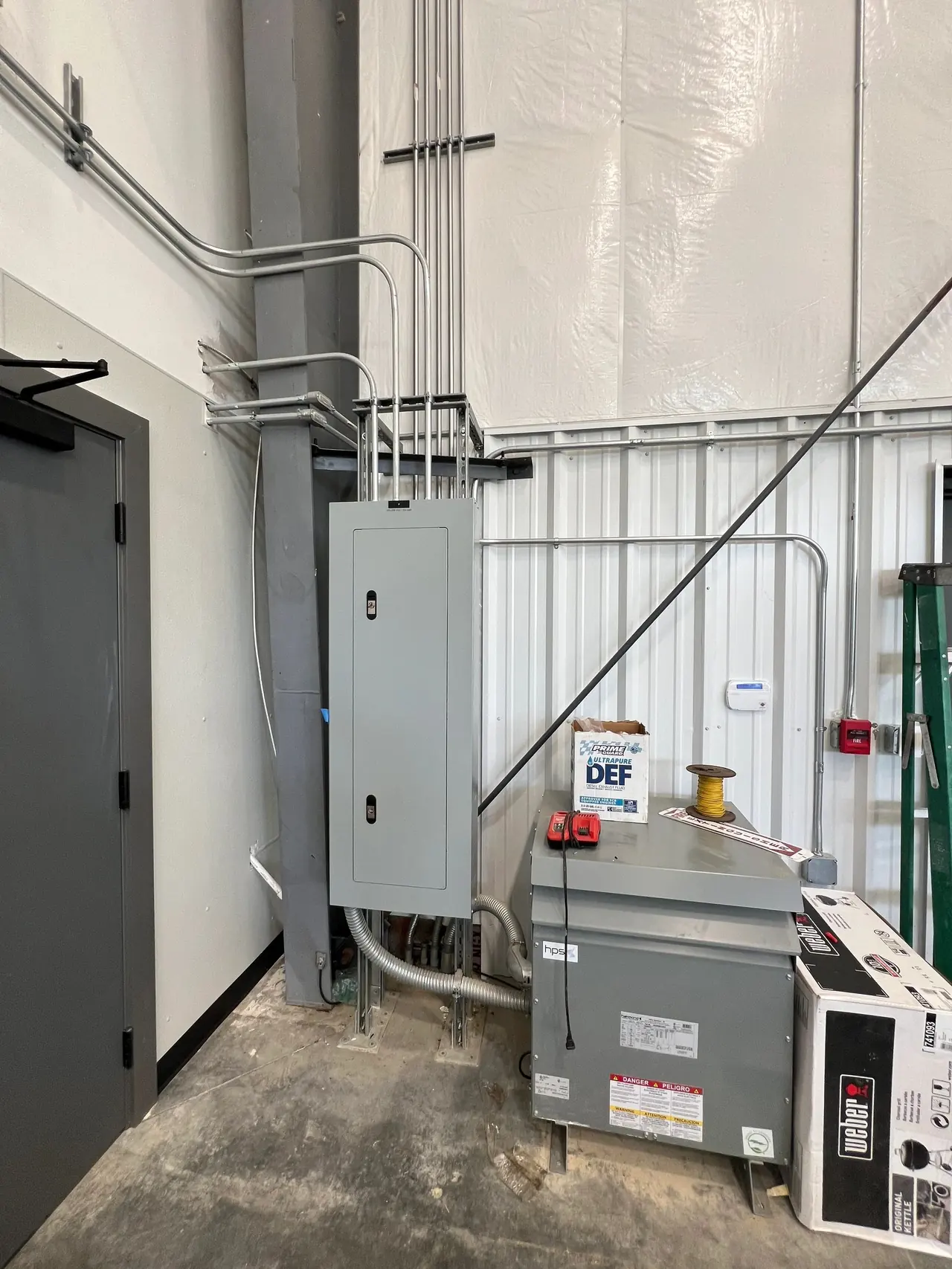 Commercial electrical panel and disconnect on an interior wall
